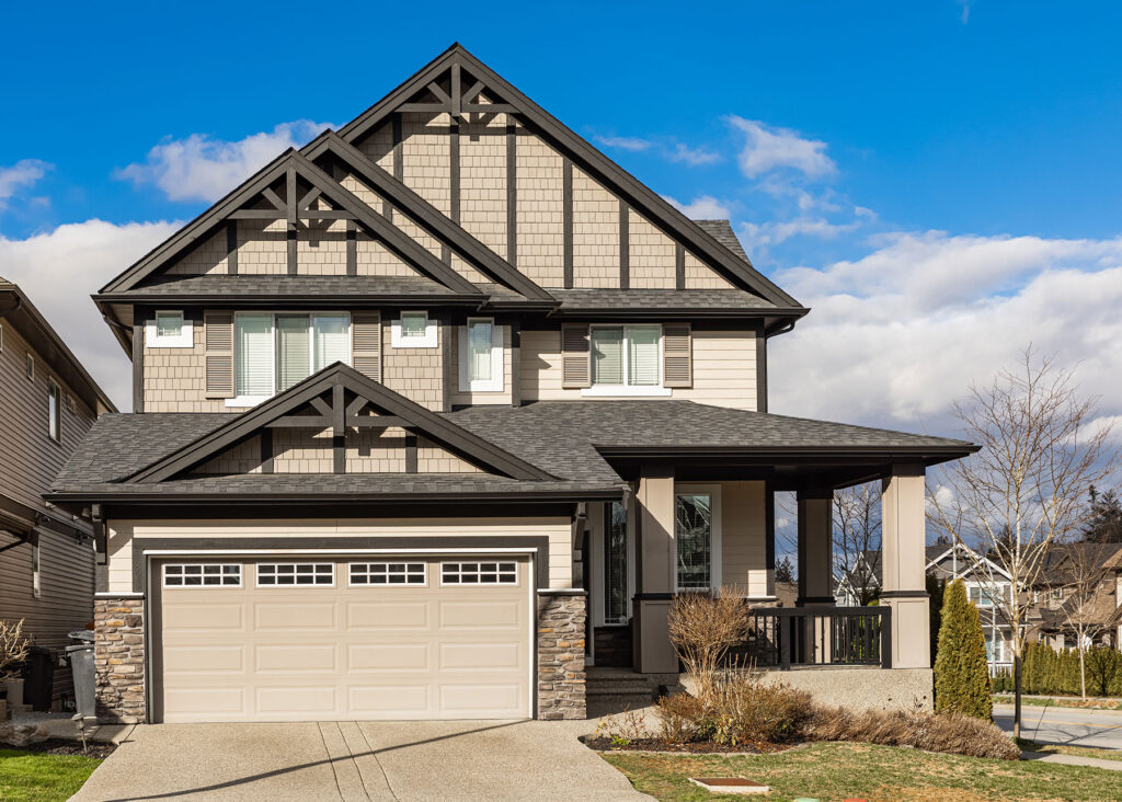 nice home with garage door main entrance